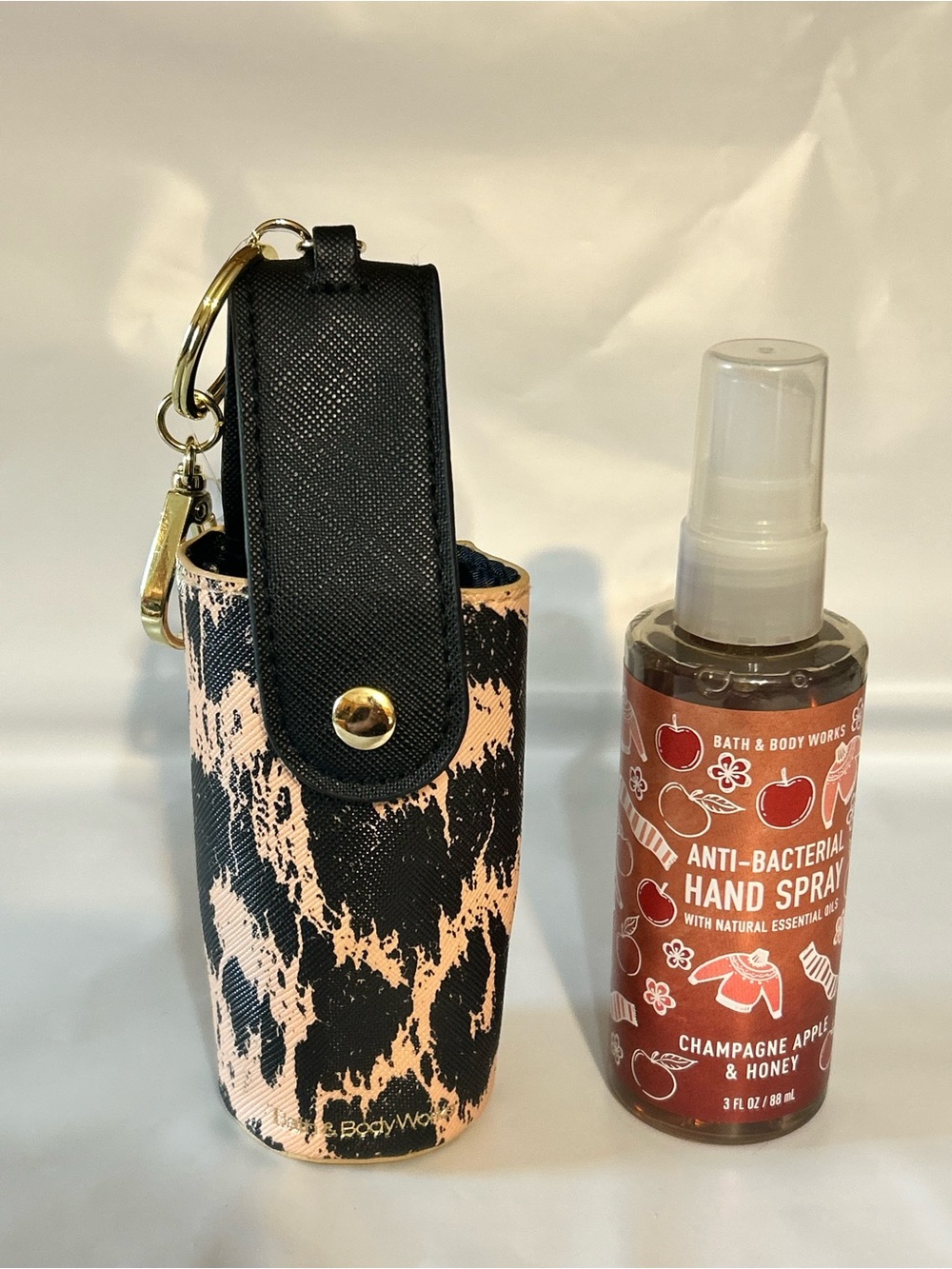 Bath & Body Works Pink and Black Patterned Spray Holder with Key Clip